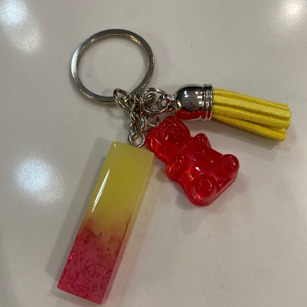 Handmade resin yellow and pink I keychain with resin gummy bear and tassel